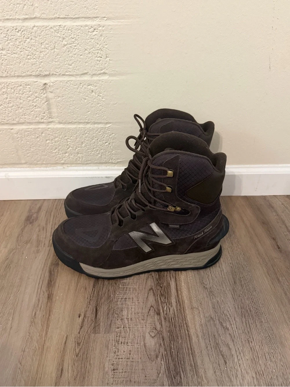 New Balance Men's Brown Lace-Up Trail Boots waterproof and insulated.